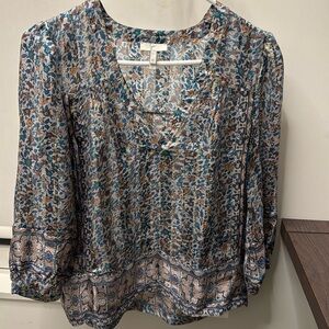 Long sleeve blue top with gold enhancements